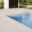 New Tiles Etna Perla 100 x 100 cm sfeerbeeld terras met zwembad